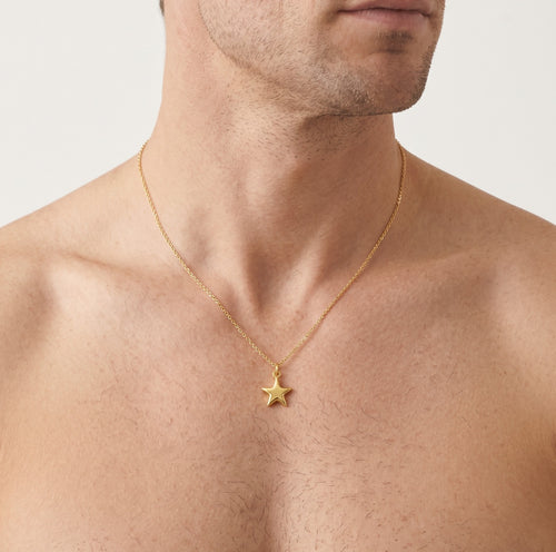Gold star pendant