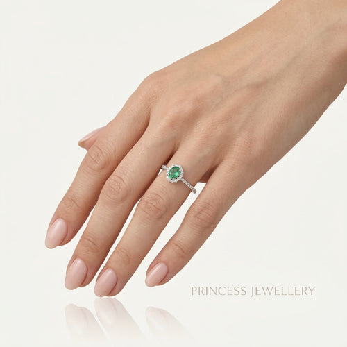 Royal Weißgold Ring mit Smaragd und Diamanten