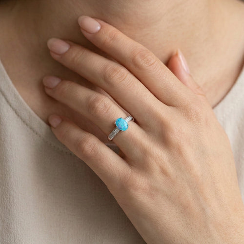 Accent blue opal ring