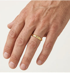 Yellow gold wedding ring with holes