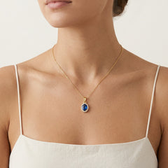 Pendentif ovale en quartz bleu et or