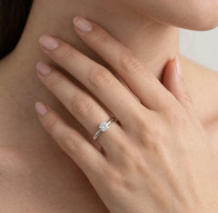 White gold ring with round diamond