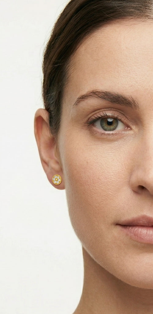 Glänzende Gelbgold-Ohrstecker mit Zirkonia