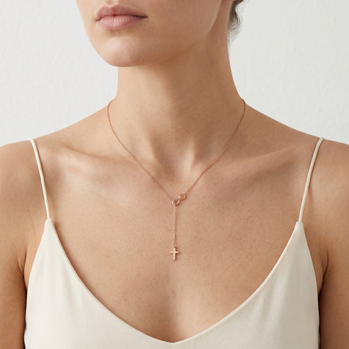 Einzigartige Halskette aus Roségold mit Kreuz- und Unendlichkeitsanhänger