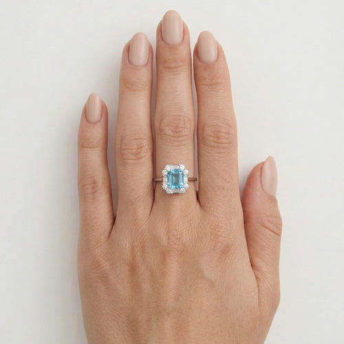Halo cushion cut blue topaz ring