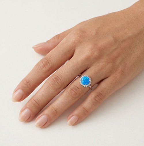 Halo round blue opal ring