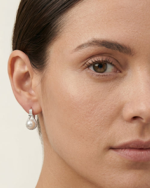 Pendientes de plata con perla y circonita cúbica decorada