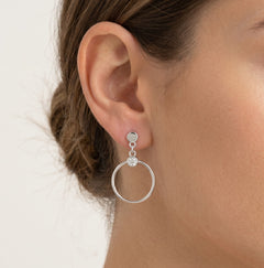 Silver stud earrings dangling circles