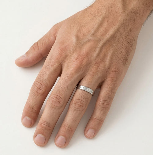 White gold solitaire wedding ring with line
