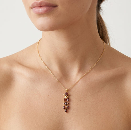 Garnet drop pendant with round and marquise stones