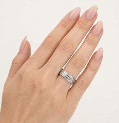 High polished white gold wedding ring with multiple lines