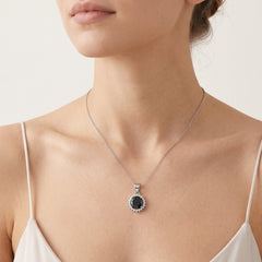Sterling silver halo pendant with onyx center