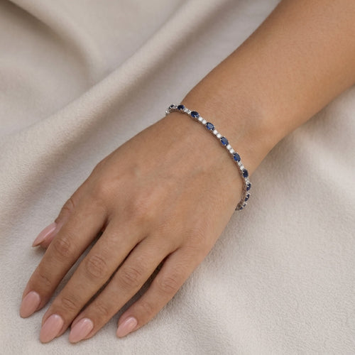 Gold-Tennisarmband mit Saphiren und Diamanten