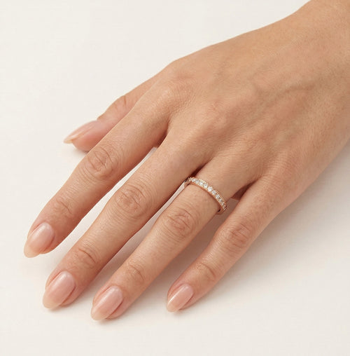 Rose gold wedding ring with prong set
