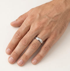 White gold wedding ring with greek pattern