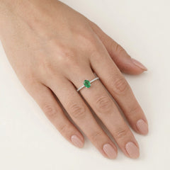 Classic white gold diamond and emerald ring