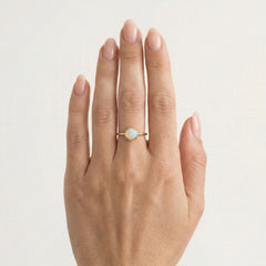 Round white opal gold ring