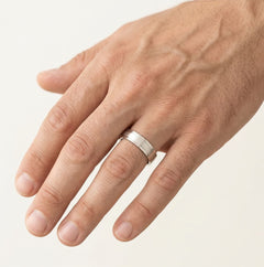 Solitaire white gold wedding ring with matte center