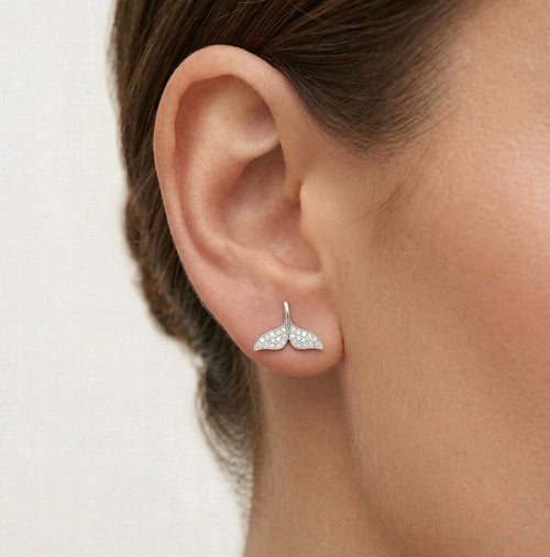 Silver earring fin of a whale