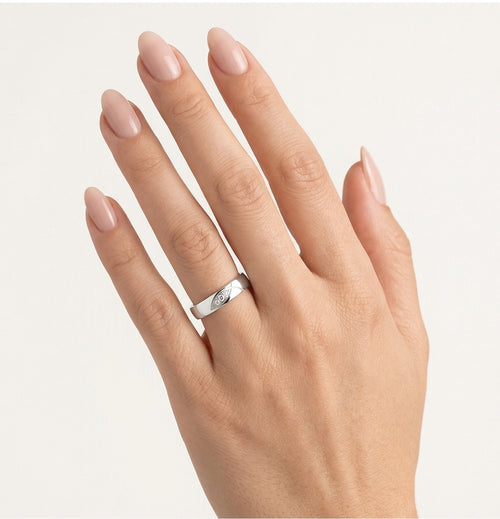 Snubní prsten z bílého zlata s motivem listů