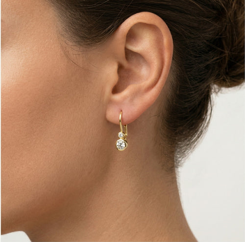 Diamant-Ohrringe aus Gold mit Zargenfassung