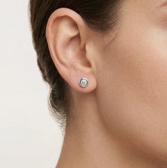 Puces en or blanc 18 K avec zircon rond serti clos