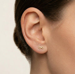 Pendientes de botón infinito de oro amarillo brillante