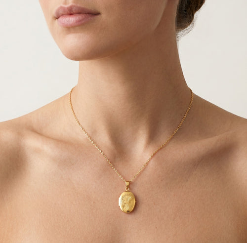 Gold-Ovalmedaillon mit Muster