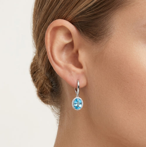 Halo-Sterlingsilber-Hängerohrringe mit Blau-Topas