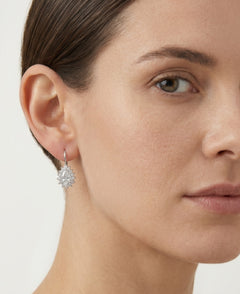 Halo pear and round cut cubic zirconia on sterling silver drop earrings