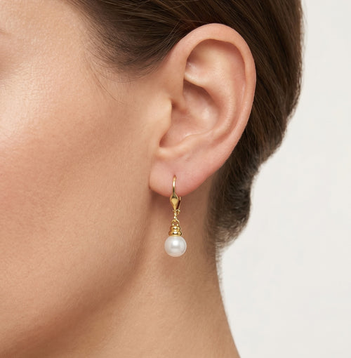 Boucles d’oreilles pendantes en or avec perles