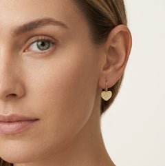 Yellow gold heart charm drop earrings