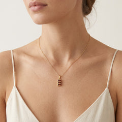 Garnet geometry gold pendant