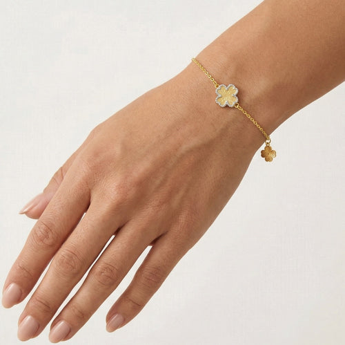 Gold bracelet with clover leaf