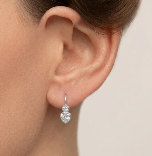 Silver drop earrings with two cubic zirconia hearts