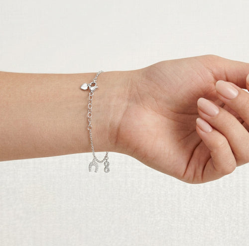 Sterling silver chain bracelet with pendants