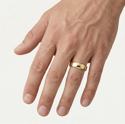 Anillo de boda elegante y ancho de oro amarillo