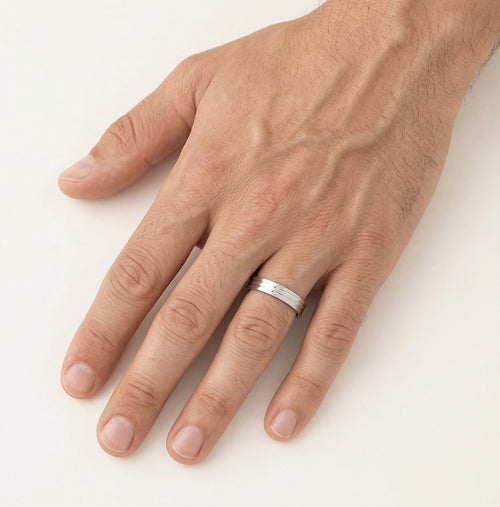 White gold solitaire wedding ring with lines
