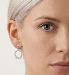 Dangling circle silver stud earrings