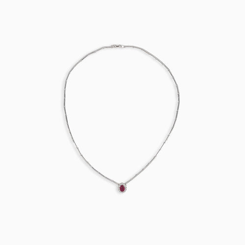 Elegante Halskette mit rundem Diamanten und ovalem Rubin