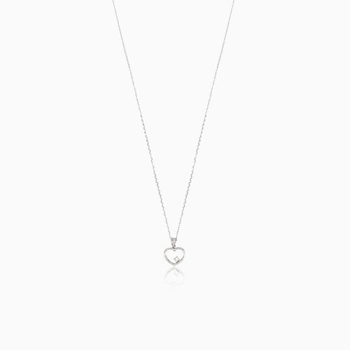 Gold heart with one diamond inside