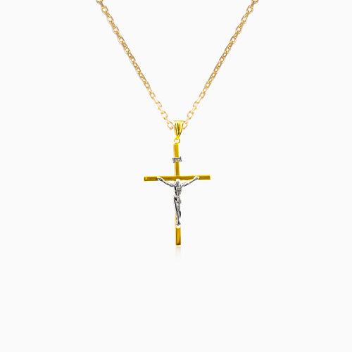 Schlichtes und dünnes goldenes Kreuz mit Jesus Christus