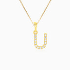 Pendentif en or lettre "U" avec zircons