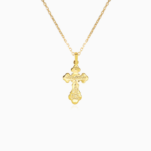 Kleines goldenes Kreuz mit detaillierter Jesus-Darstellung