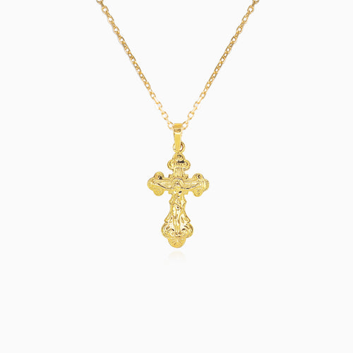 Kleines goldenes Kreuz mit detaillierter Jesus-Darstellung