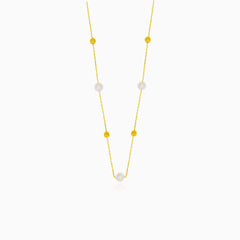 Gold necklace with pearls and gold balls
