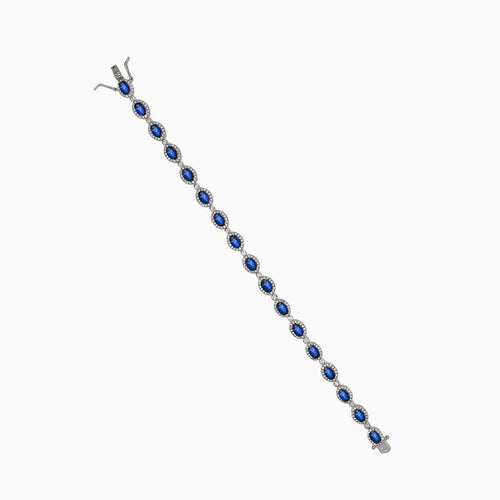 Royal silver bracelet with sapphire and zircons