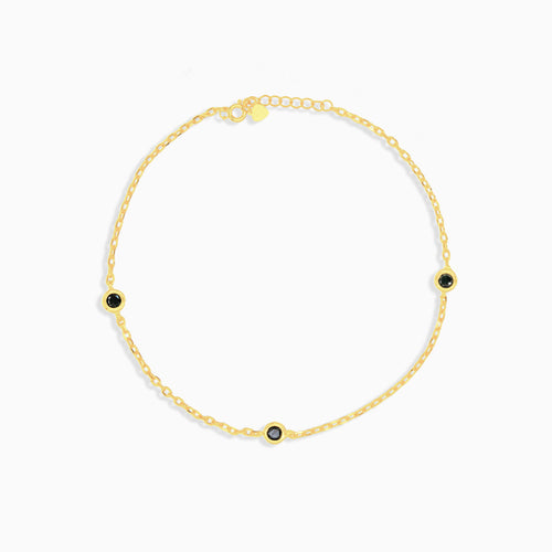 Vergoldetes Armband mit drei Onyxsteinen
