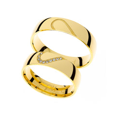 Thick yellow gold heart wedding rings