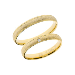 Matte yellow gold wedding ring with line detail